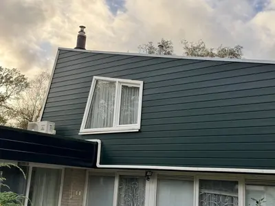Renovatie gevelbekleding Hengelo, Keralit Sponningdeel 143 Donkergroen