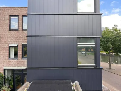 Loslatende Trespa vervangen door 130m2 Keralit gevelbekleding in Apeldoorn – foto 5