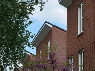 Boeidelen bekleden in Almelo bij zes woningen – foto 11